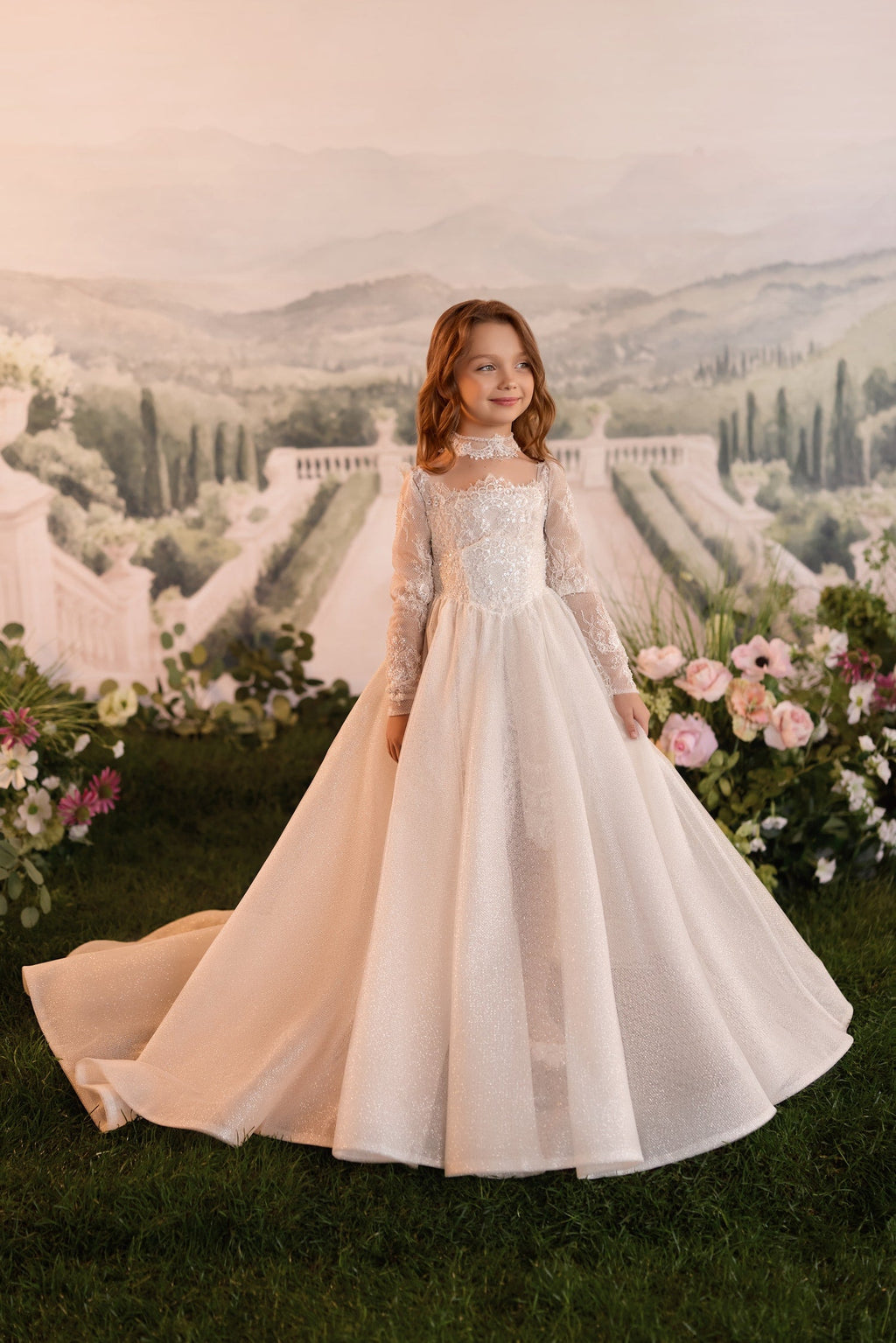 Abito da bambina con corpetto in pizzo, cintura corsetto e gonna glitter